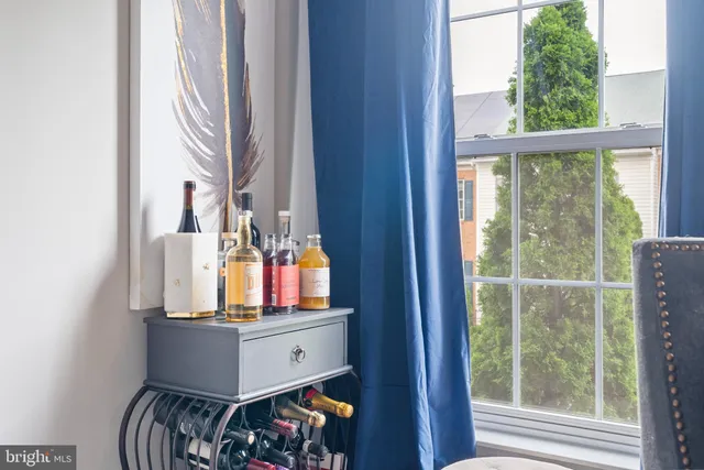 a room with window and furniture