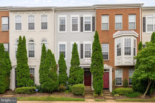 a front view of a multi story residential apartment building