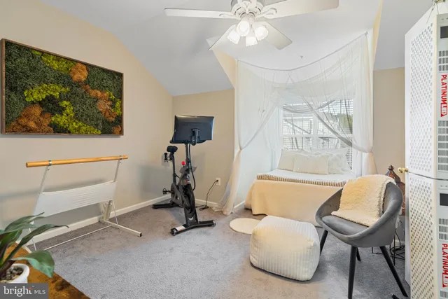 a bathroom with a sink toilet vanity and shower