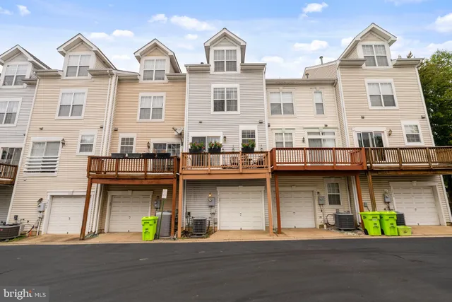a front view of a building with lots of windows