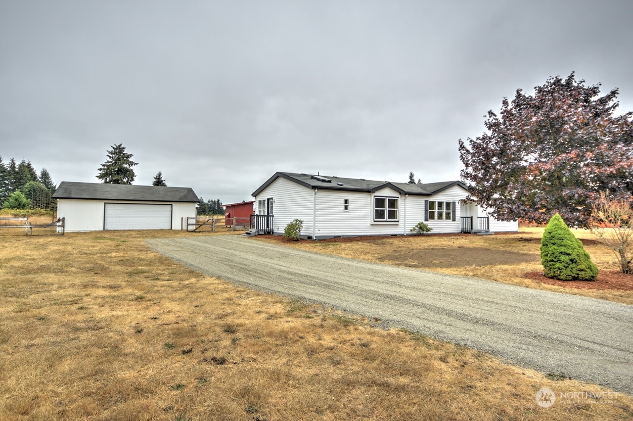 19212 Old Ranch Lane Southwest Rochester, WA 98579 - Photo 1 of 33 a house view with a outdoor space