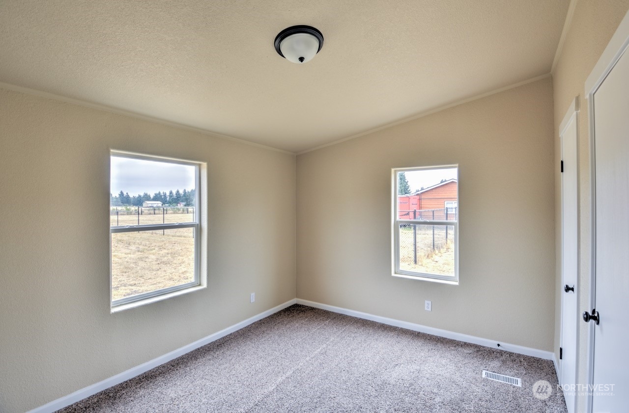 19212 Old Ranch Lane Southwest Rochester, WA 98579 - Photo 19 of 33 a view of an empty room with a window
