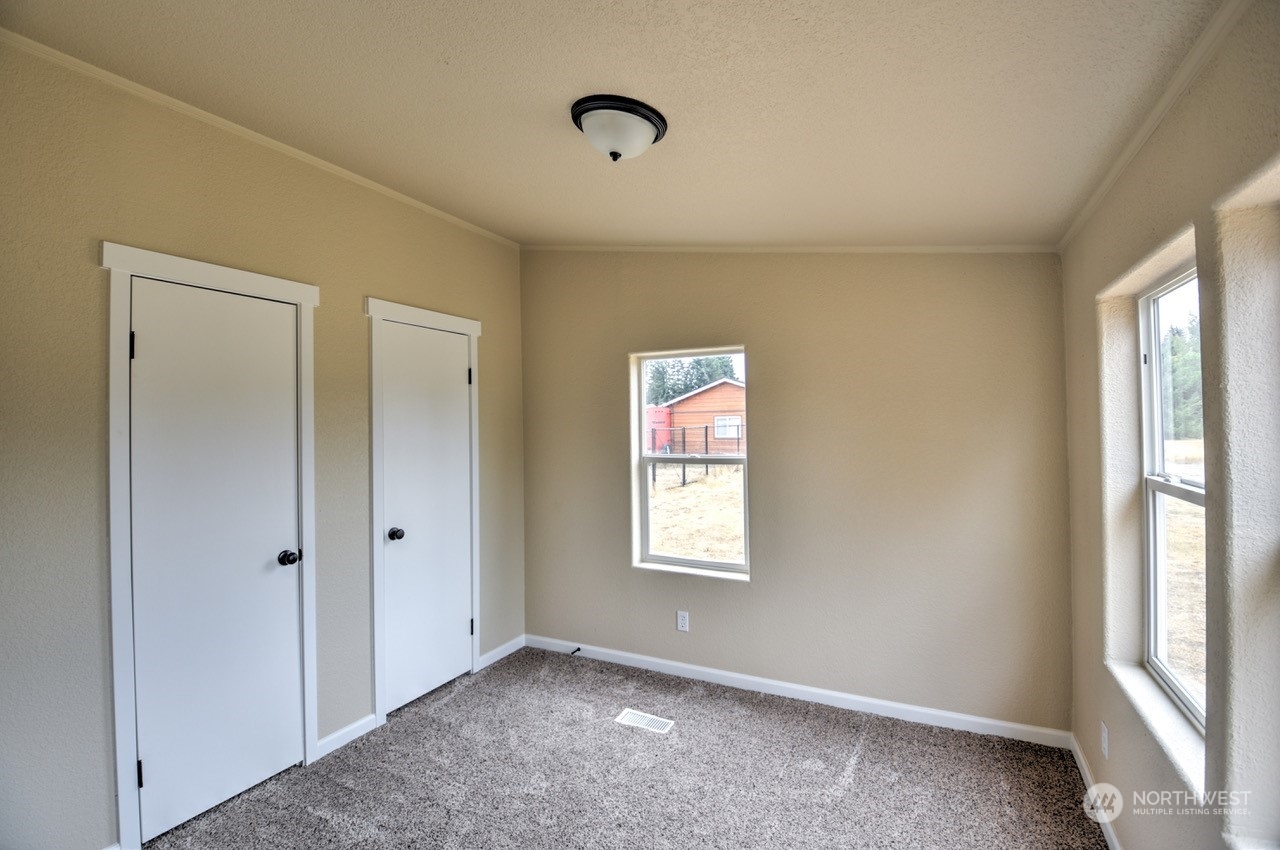 19212 Old Ranch Lane Southwest Rochester, WA 98579 - Photo 24 of 33 a view of an empty room with a window