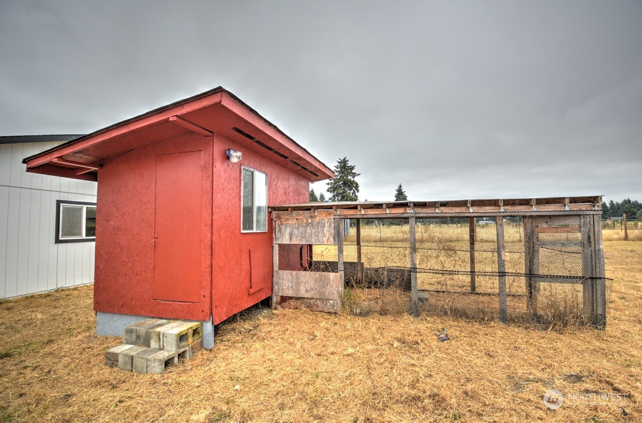 19212 Old Ranch Lane Southwest Rochester, WA 98579 - Photo 27 of 33 a front view of a house with a yard