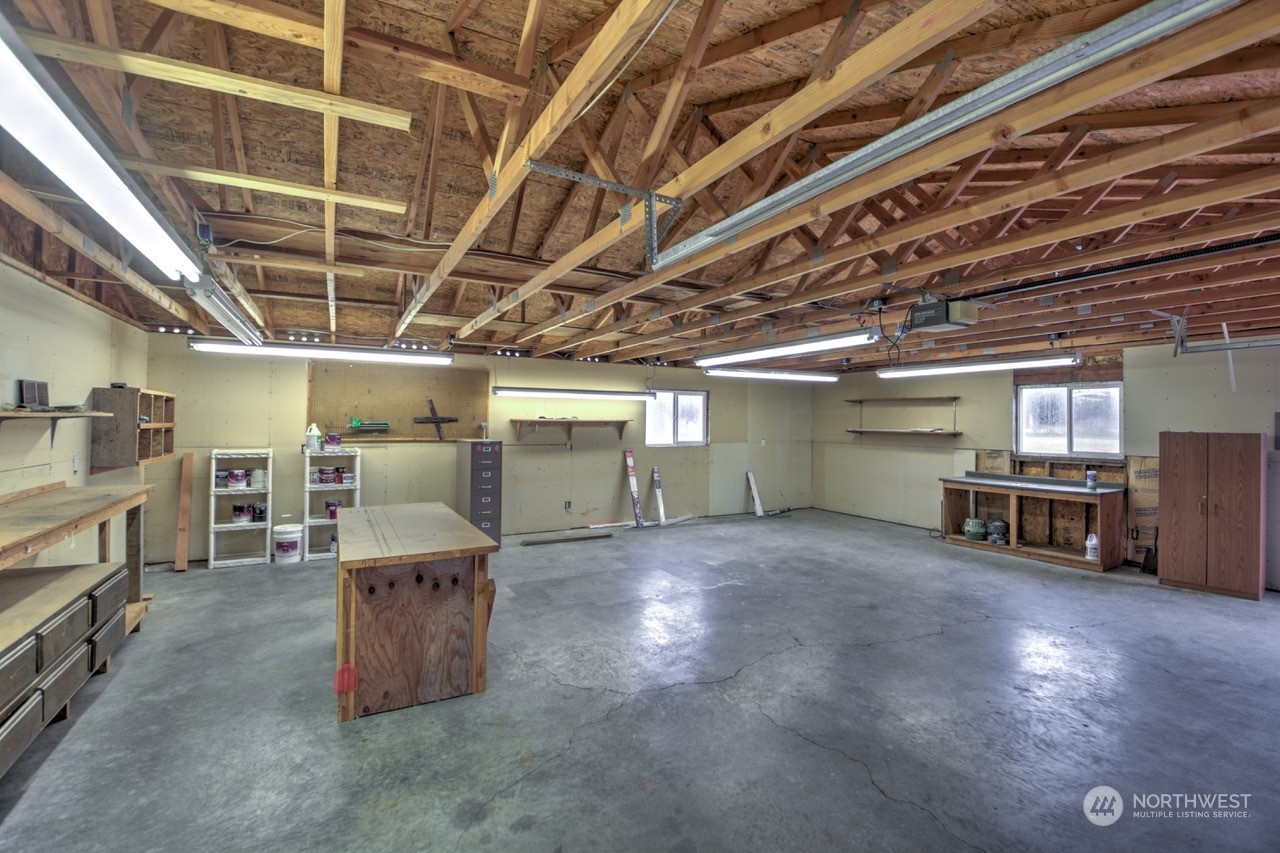 19212 Old Ranch Lane Southwest Rochester, WA 98579 - Photo 29 of 33 a view of a room with wooden racks