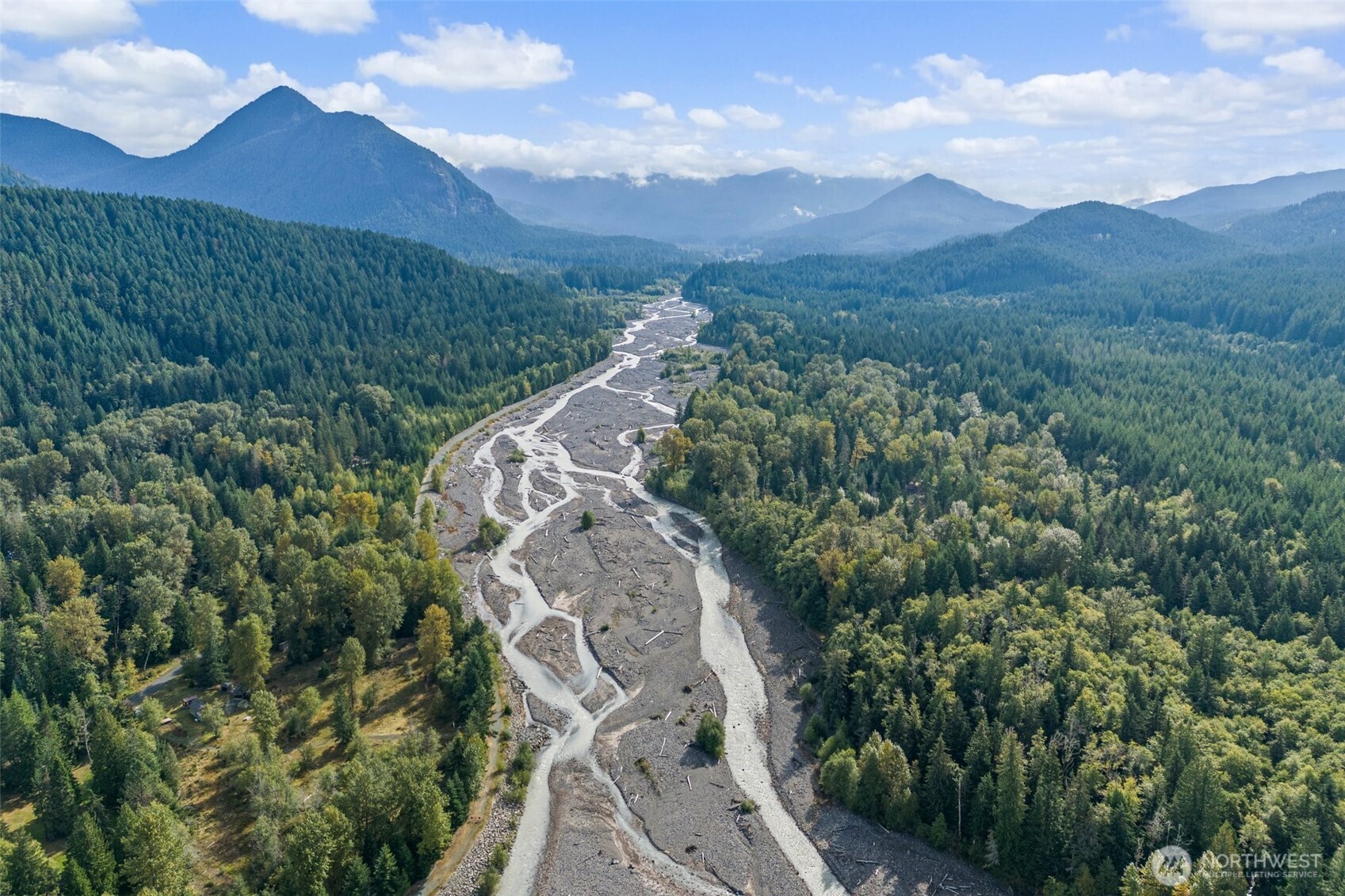 1 Skate Creek Road North Ashford, WA 98304 - Photo 34 of 36 a view of a house with a yard and mountain