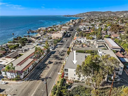 a front view of a house with a street