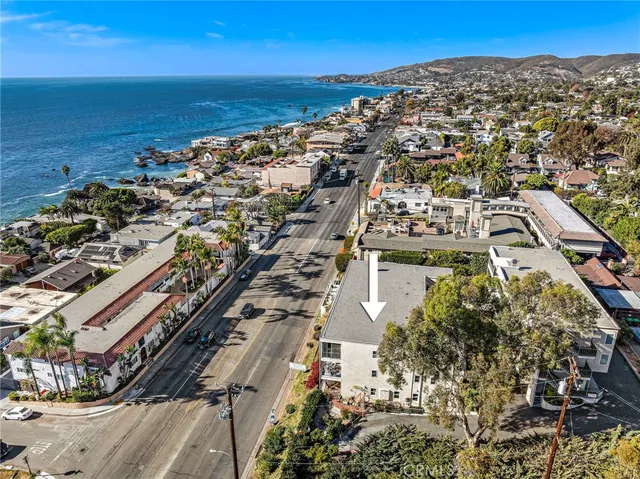 an aerial view of a house with outdoor space