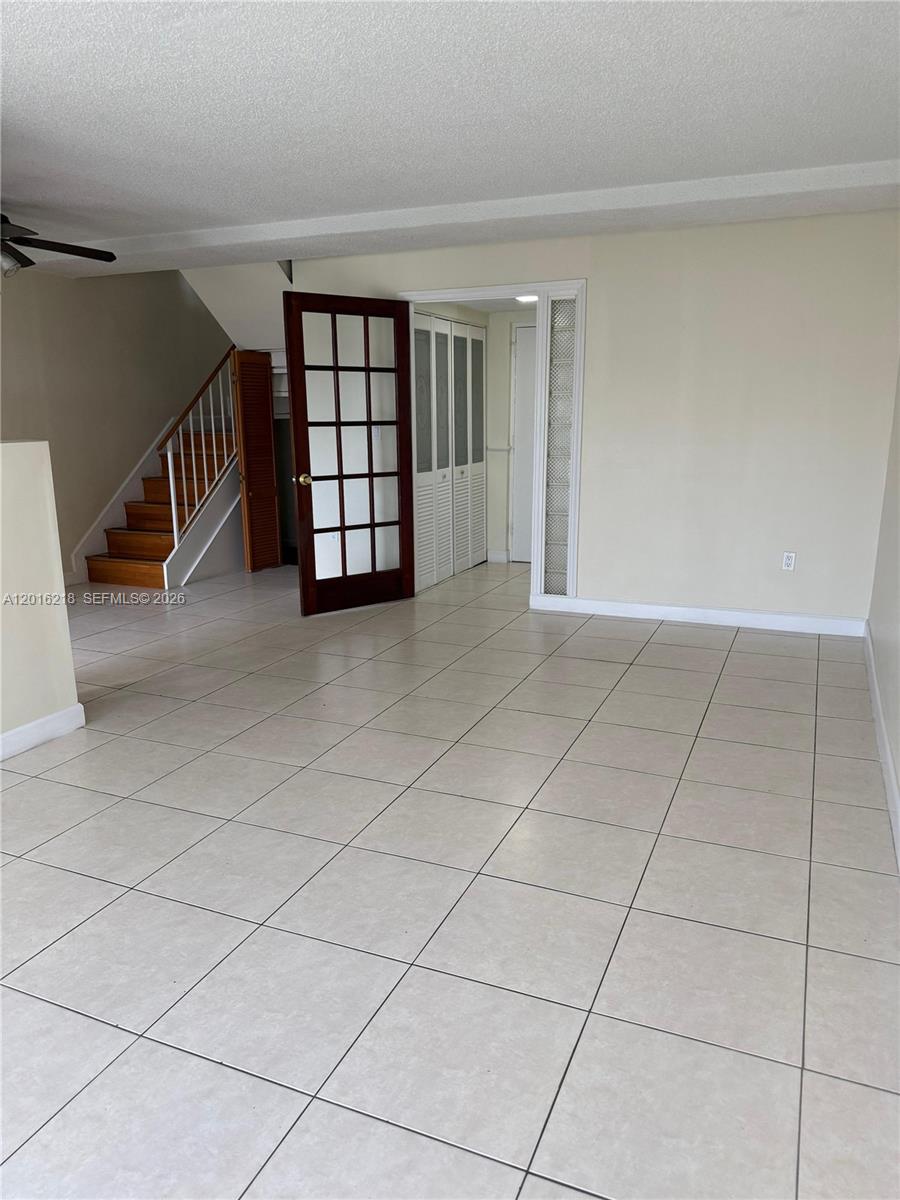 9321 Southwest 4th Street, Unit 230C Miami, FL 33174 - Photo 12 of 37 a view of an empty room and window
