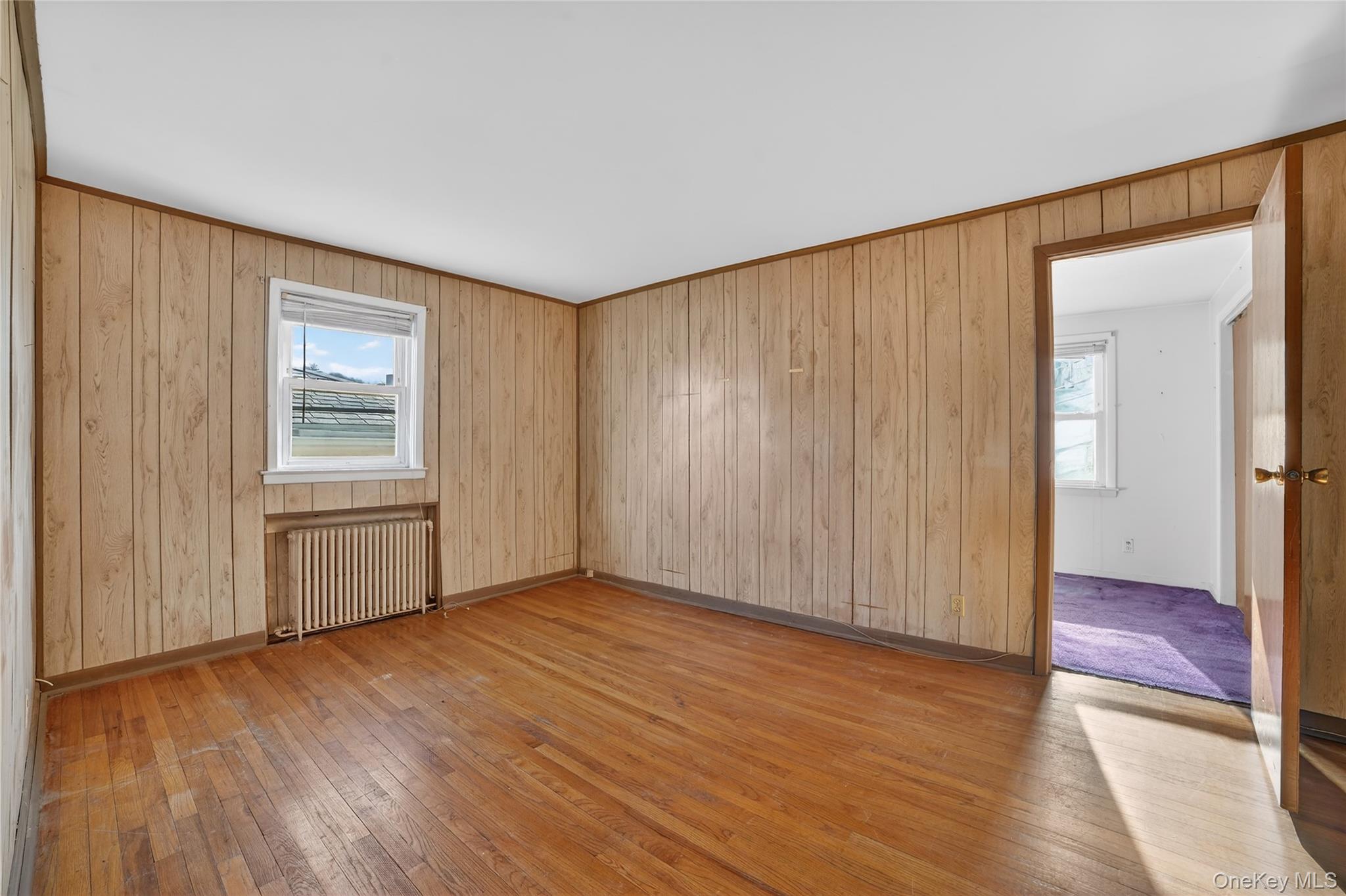 41 Devoe Street Dobbs Ferry, NY 10522 - Photo 12 of 28 an empty room with wooden floor and windows