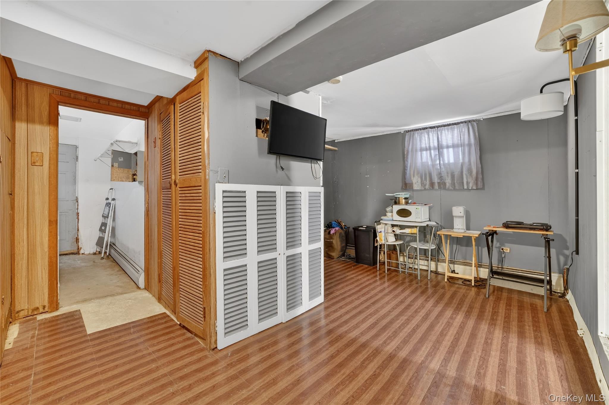 41 Devoe Street Dobbs Ferry, NY 10522 - Photo 22 of 28 a view of livingroom with furniture and floor to ceiling window