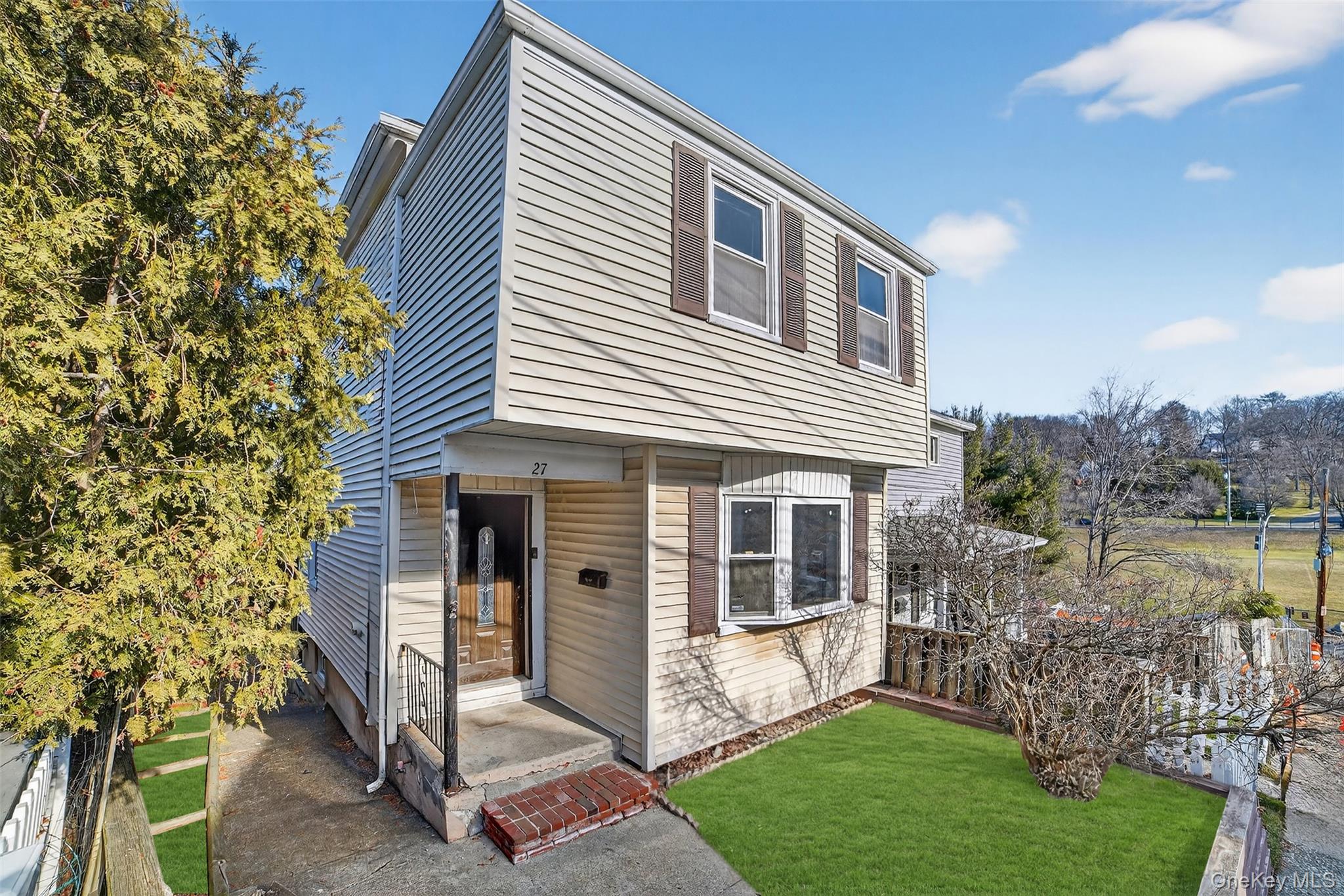 41 Devoe Street Dobbs Ferry, NY 10522 - Photo 3 of 28 a view of a house with backyard and a tree