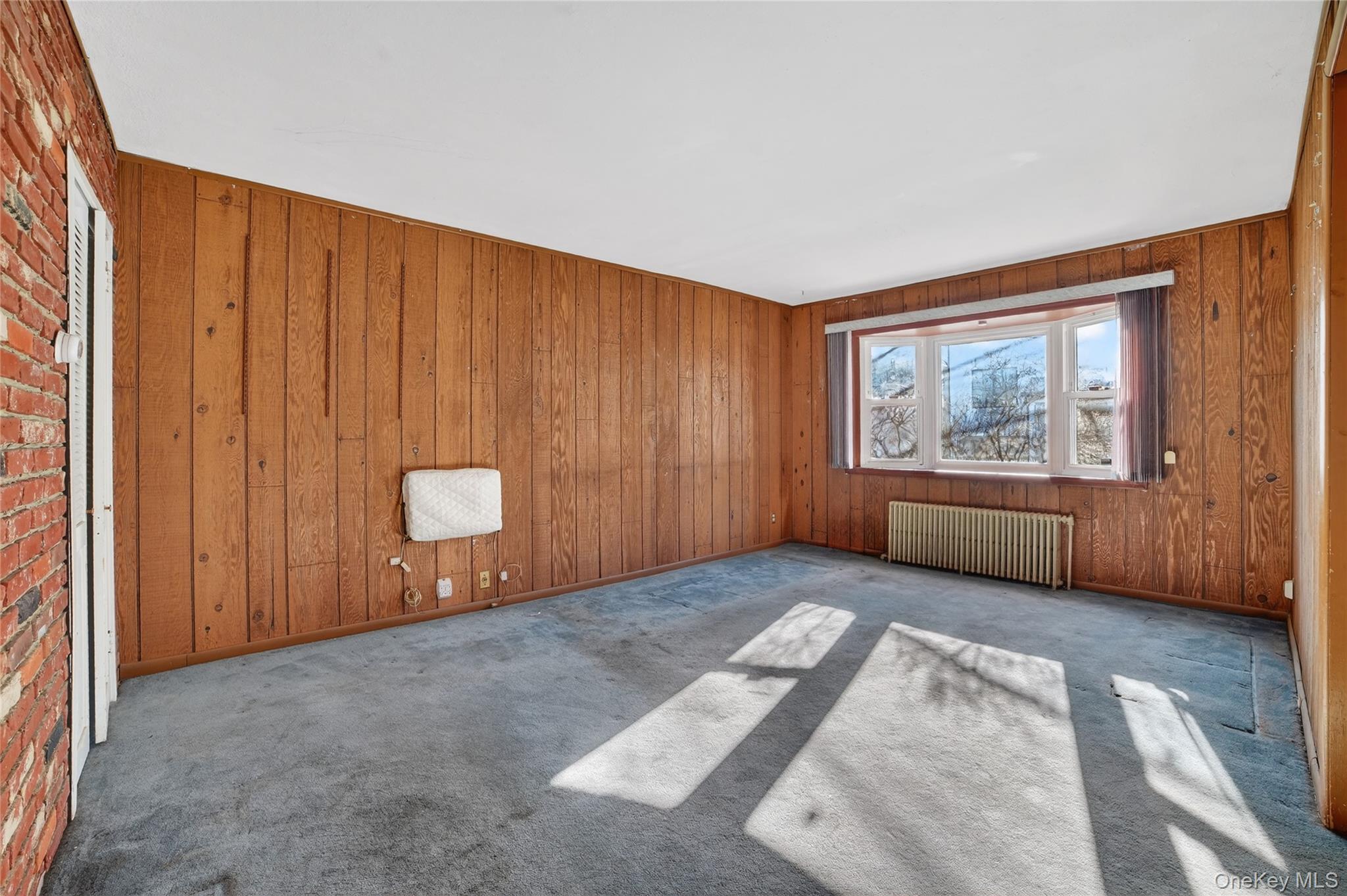 41 Devoe Street Dobbs Ferry, NY 10522 - Photo 7 of 28 a view of an empty room with a window