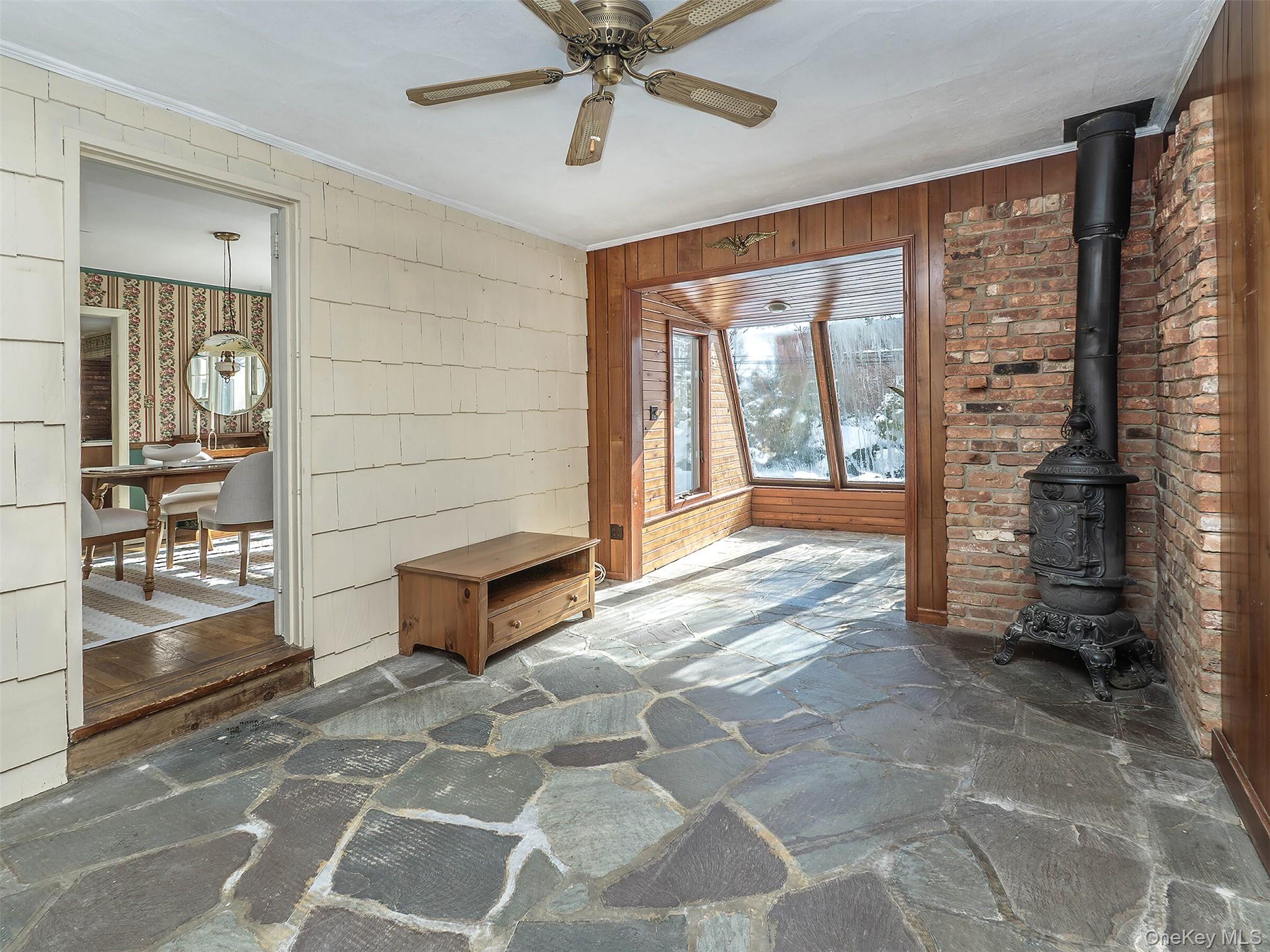 24 Orchard Farm Road Port Washington, NY 11050 - Photo 20 of 20 a spacious bedroom with a large bed and a window