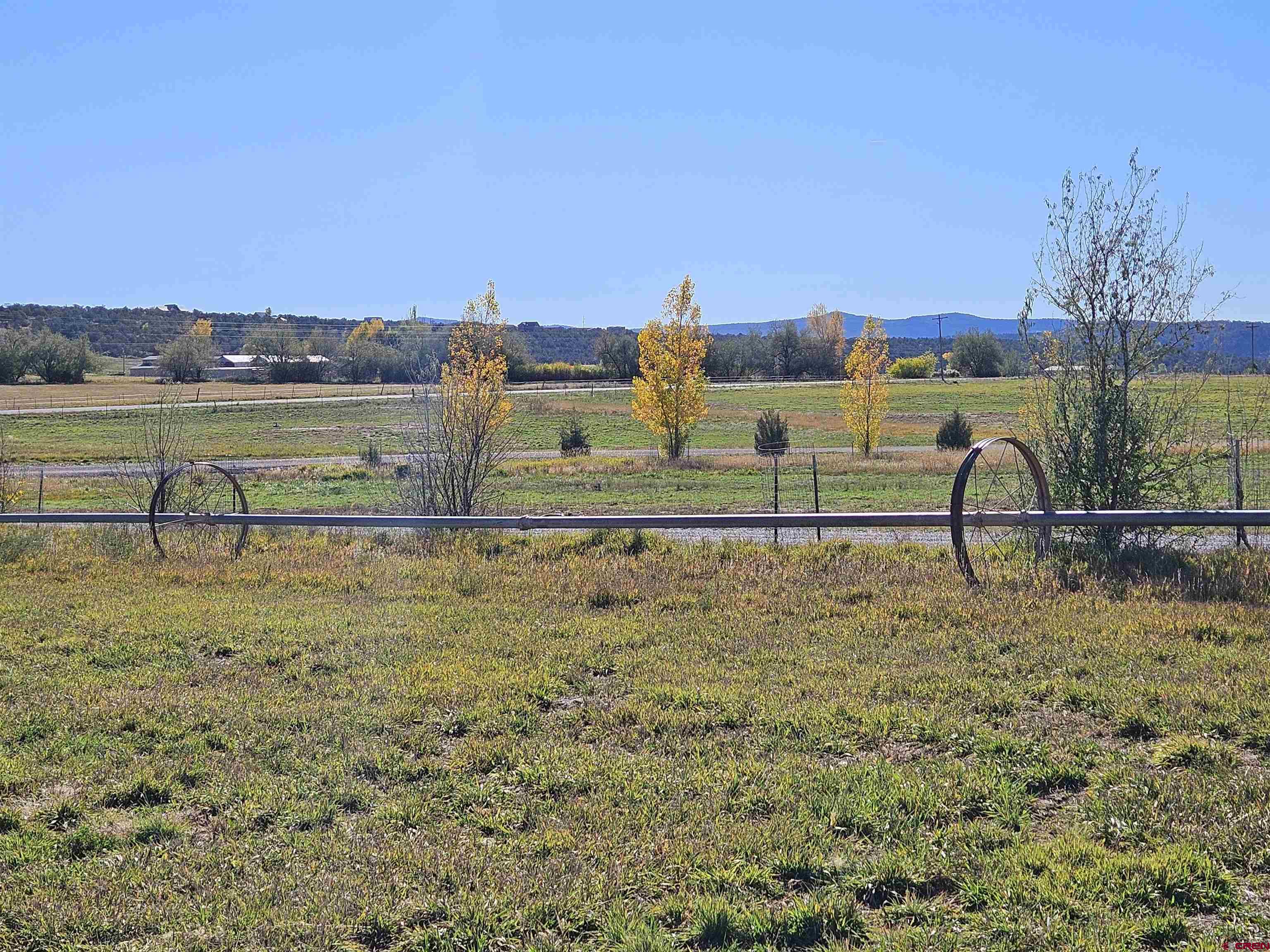 239 Hawk View Drive Durango, CO 81303 - Photo 5 of 9 a view of a lake with houses in the background