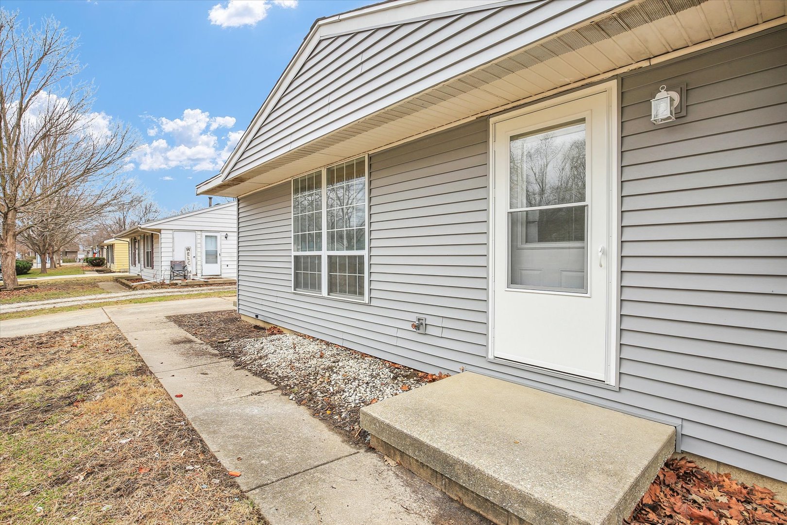 3206 York Drive Champaign, IL 61821 - Photo 11 of 24 a view of a house with a backyard
