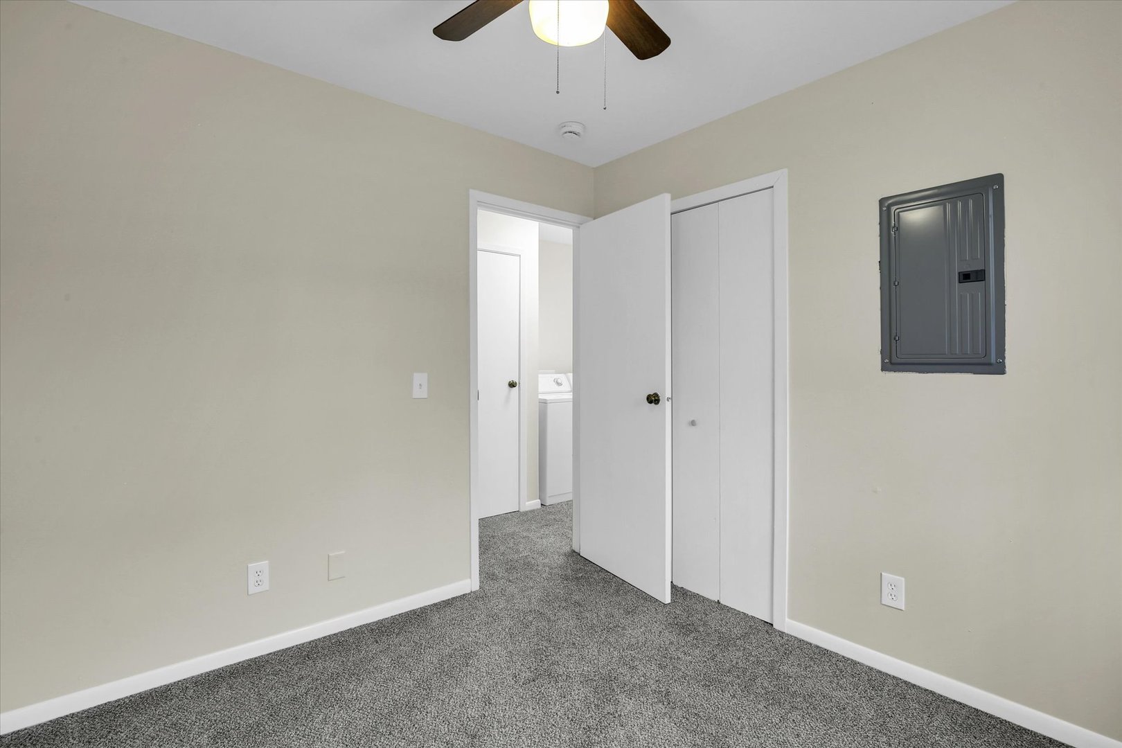 3206 York Drive Champaign, IL 61821 - Photo 19 of 24 a view of an empty room and chandelier fan
