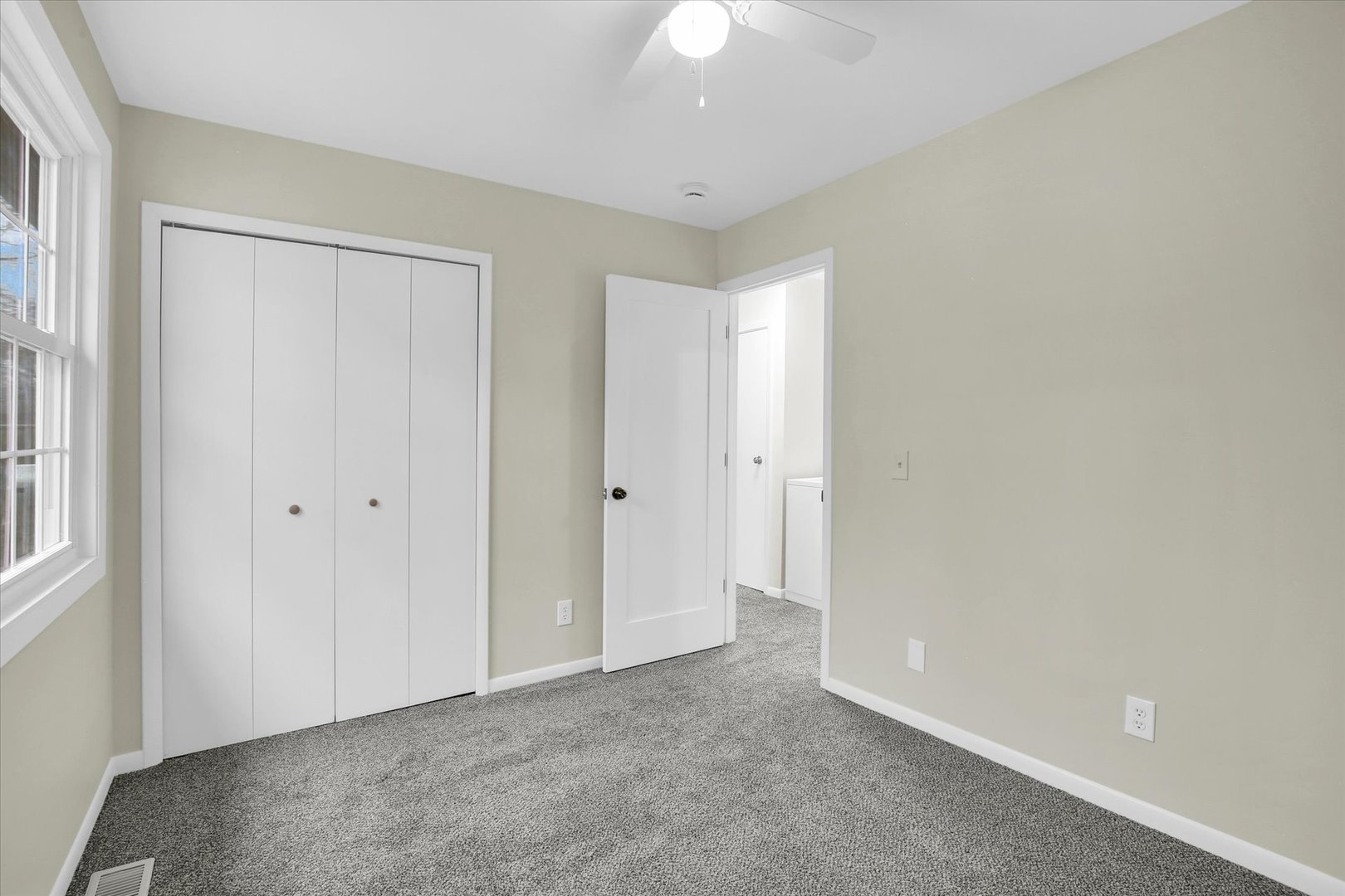 3206 York Drive Champaign, IL 61821 - Photo 21 of 24 a view of an empty room and a window