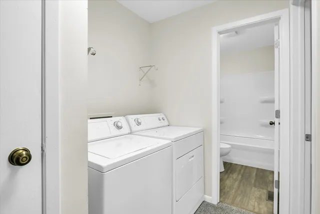 a utility room with dryer and washer