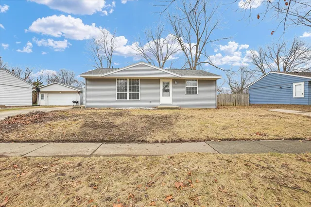 a front view of house with yard
