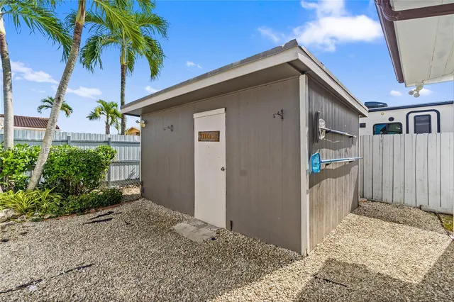 a house view with a potted plant