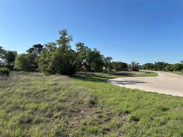 a view of a garden and basketball court