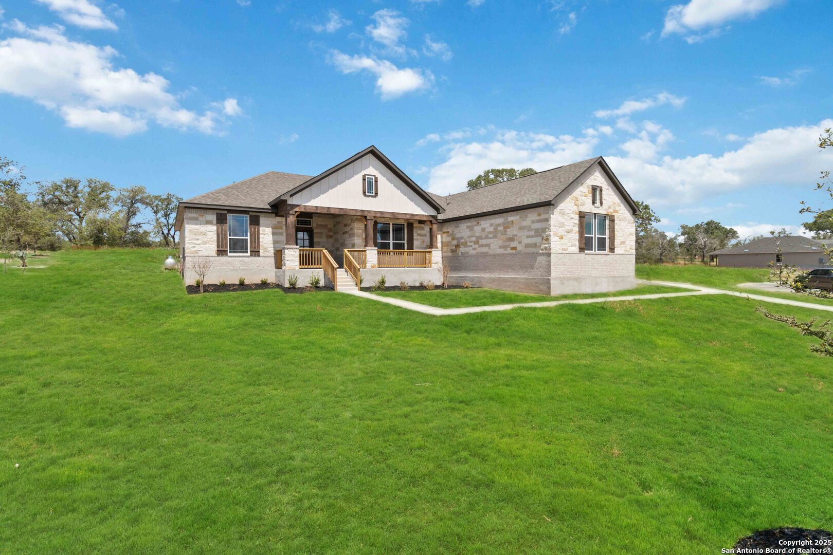21225 Jordans Ranch Way San Antonio, TX 78264 - Photo 2 of 30 a view of a house with a yard