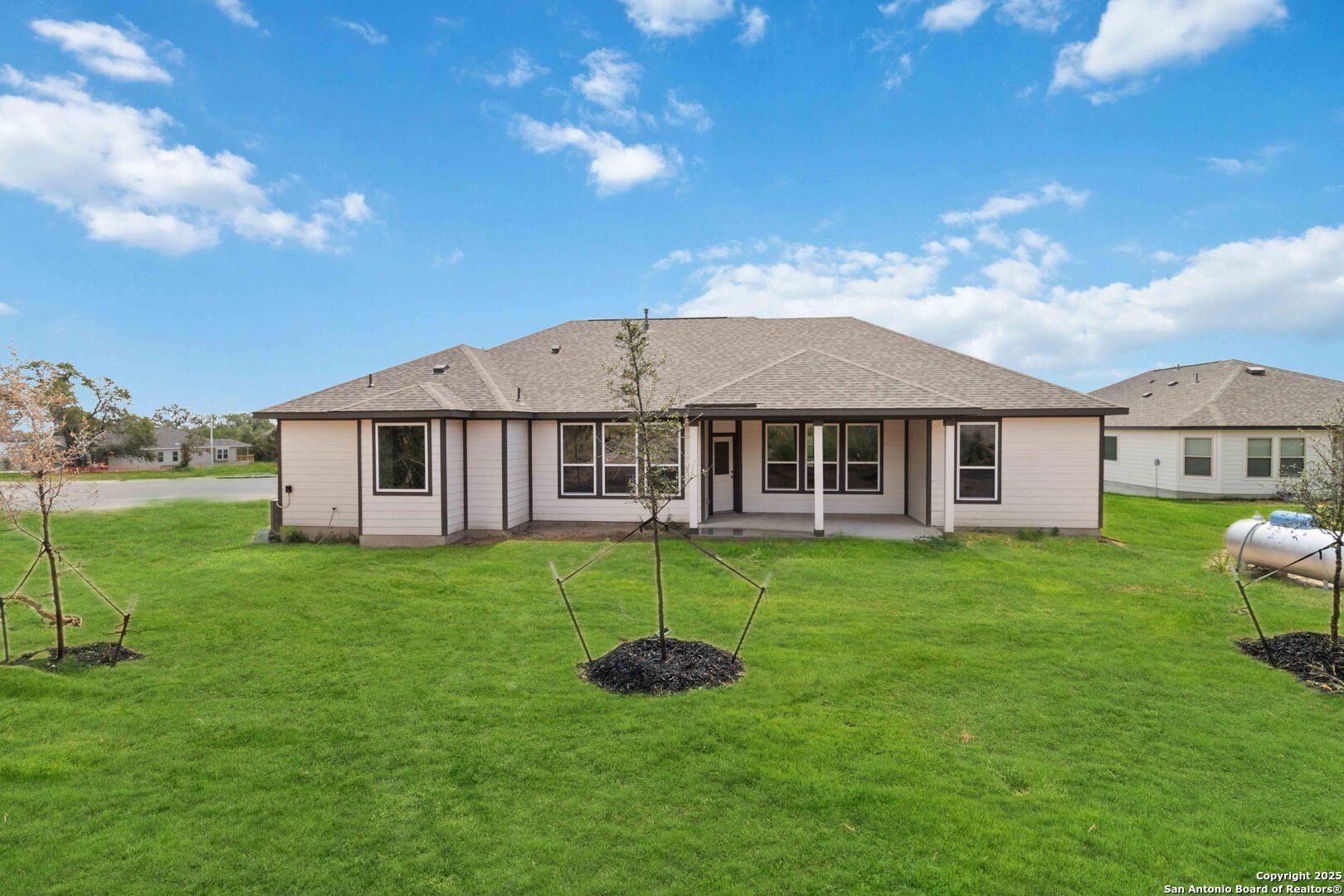 21225 Jordans Ranch Way San Antonio, TX 78264 - Photo 29 of 30 a view of a house with a backyard