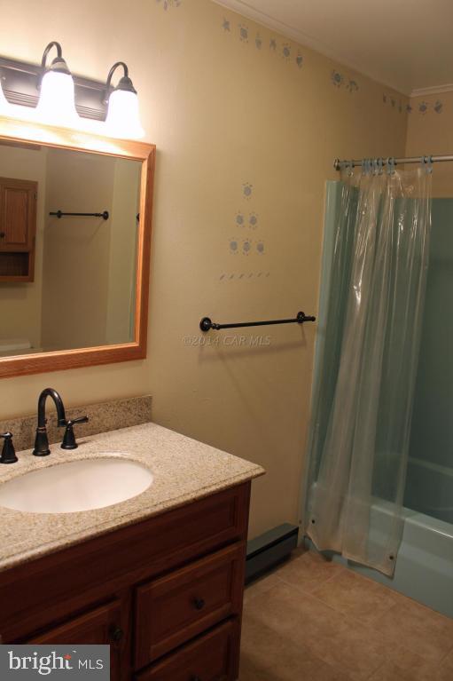 20 Brookside Road Ocean Pines, MD 21811 - Photo 12 of 20 a bathroom with a sink and mirror