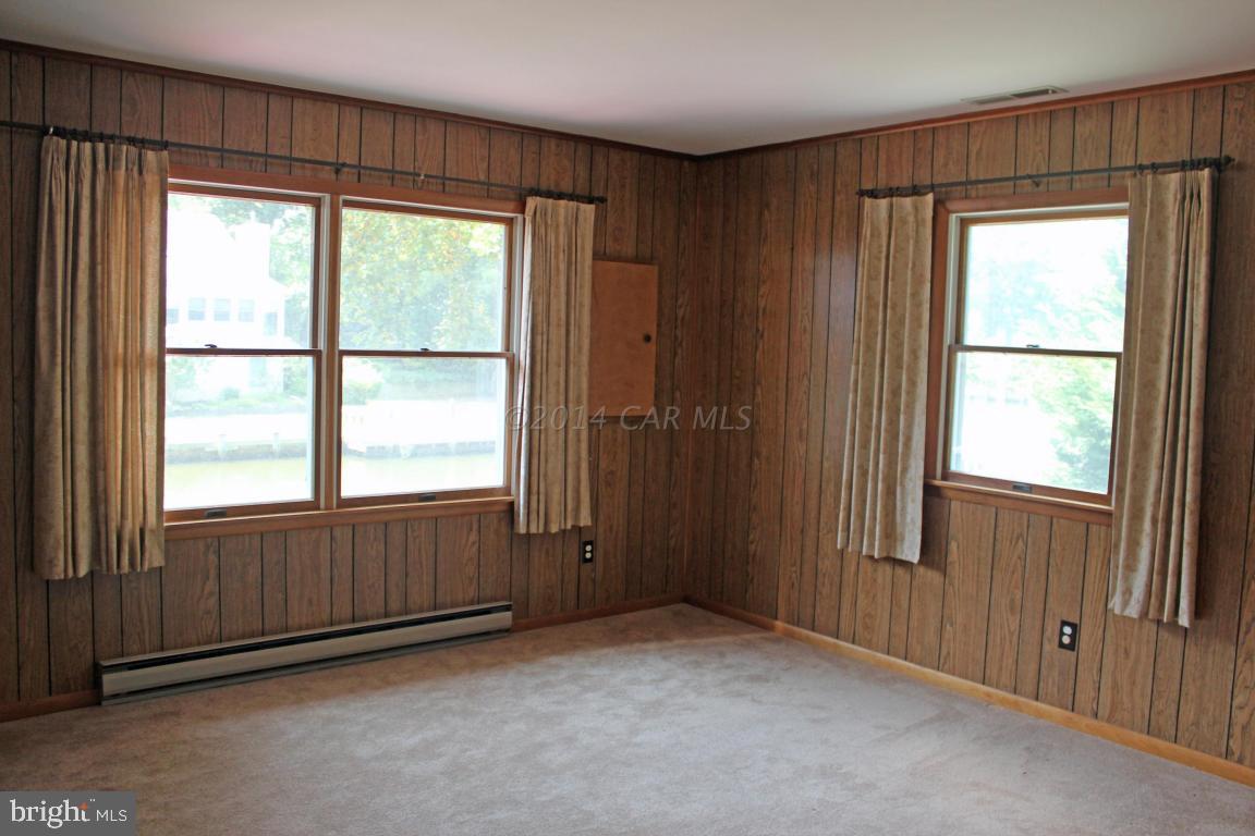 20 Brookside Road Ocean Pines, MD 21811 - Photo 14 of 20 an empty room with windows