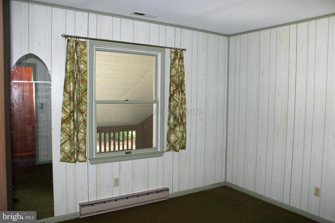 20 Brookside Road Ocean Pines, MD 21811 - Photo 16 of 20 a view of a door and wooden floor in a room