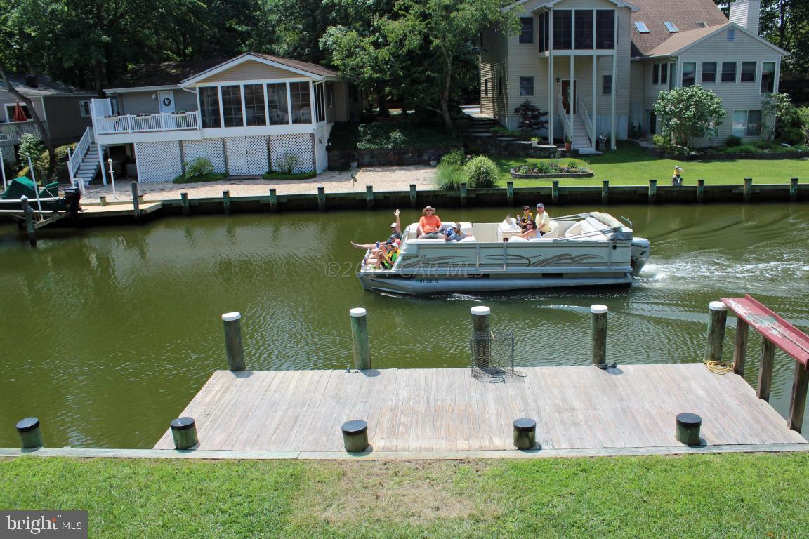 20 Brookside Road Ocean Pines, MD 21811 - Photo 17 of 20 a view of a house with pool and a yard