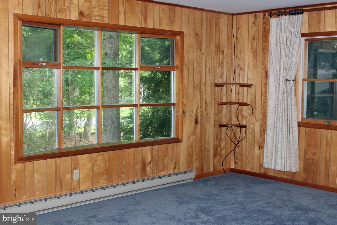 20 Brookside Road Ocean Pines, MD 21811 - Photo 4 of 20 an empty room with windows