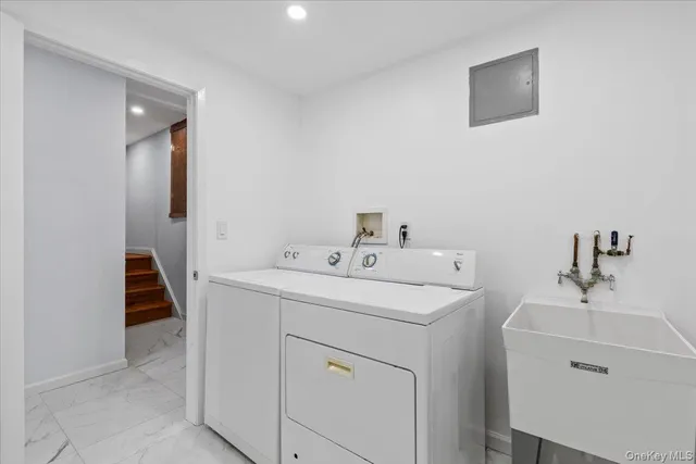 a utility room with dryer and washer