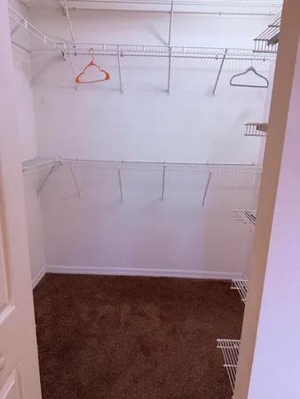 a view of a room with racks on the wall