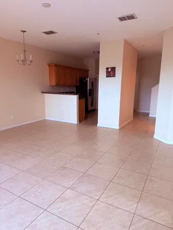 a view of a kitchen with a sink
