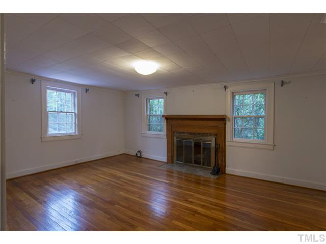 3423 Hope Valley Road Durham, NC 27707 - Photo 14 of 23 Heart Pine Mantle and Dressing Room in the Master Bedroom