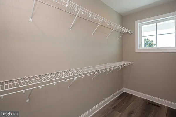 an aerial view of a houses with a lake view