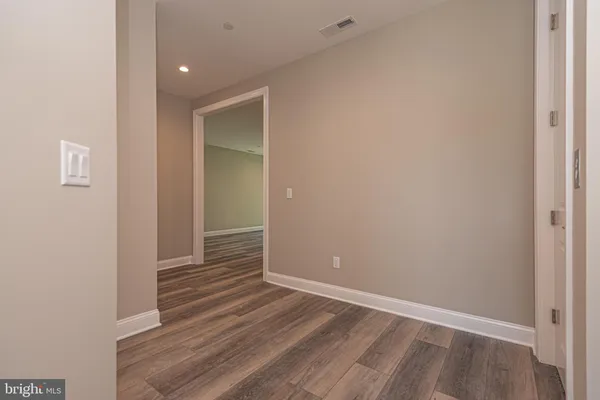 an aerial view of a house with a lake view
