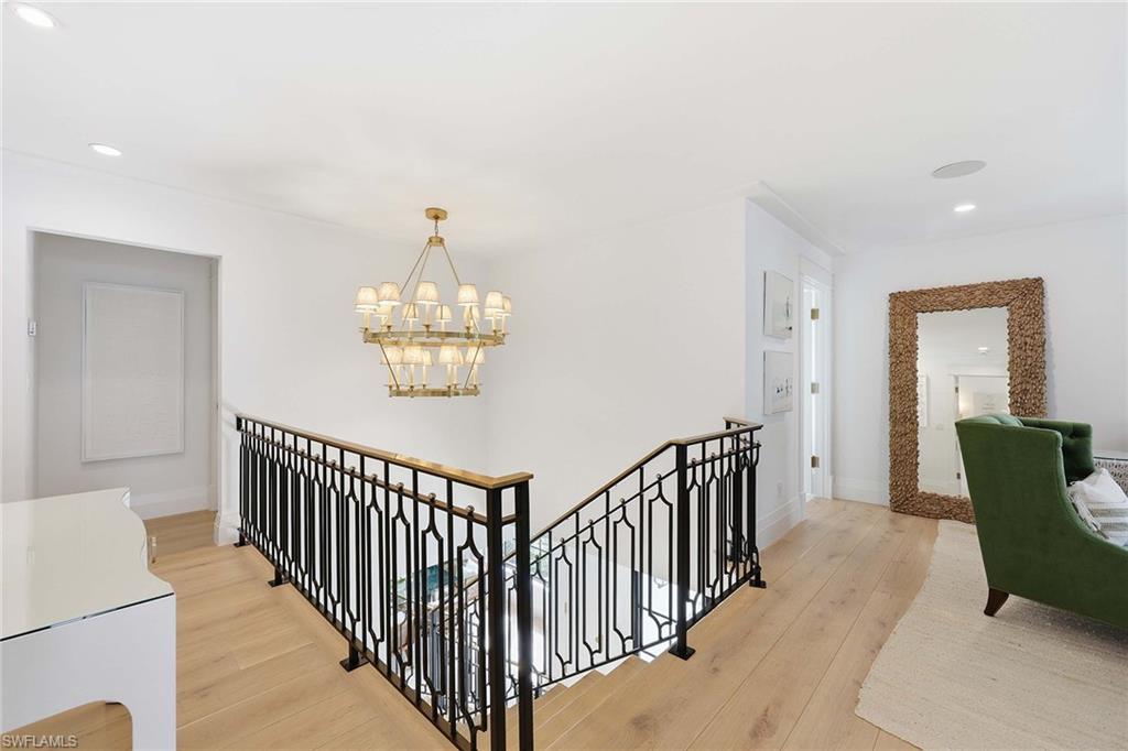 1355 4th Street South Naples, FL 34102 - Photo 36 of 50 a view of entryway with wooden floor