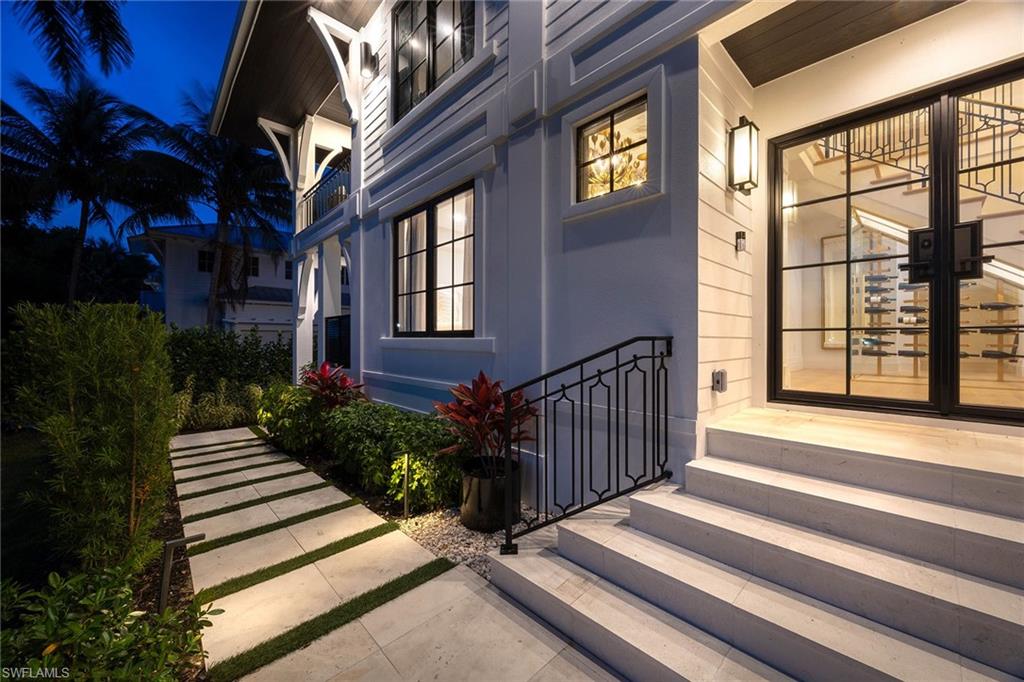 1355 4th Street South Naples, FL 34102 - Photo 46 of 50 a view of a house with a porch