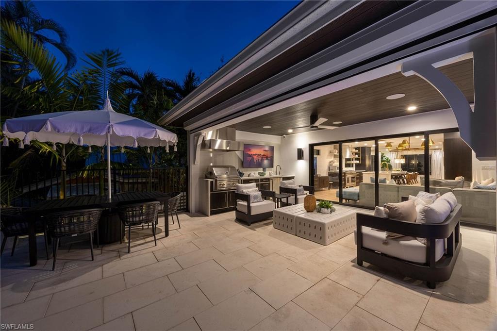 1355 4th Street South Naples, FL 34102 - Photo 47 of 50 a outdoor space with patio lots of furniture