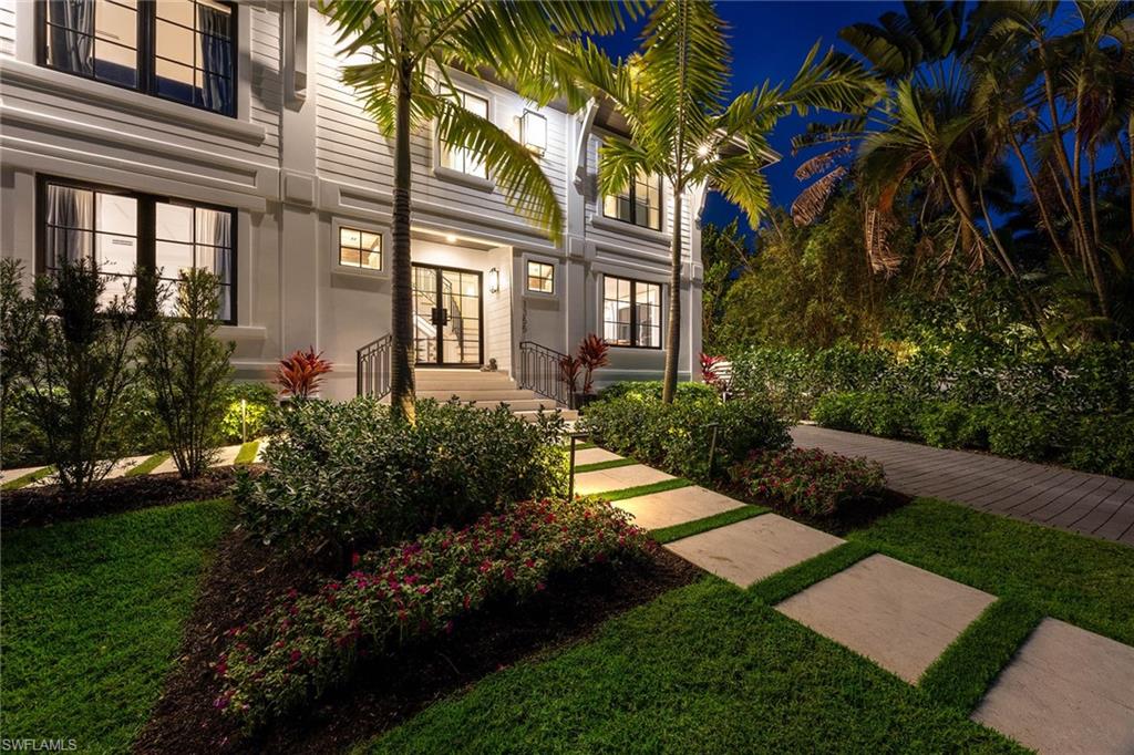 1355 4th Street South Naples, FL 34102 - Photo 48 of 50 a view of a building with a yard