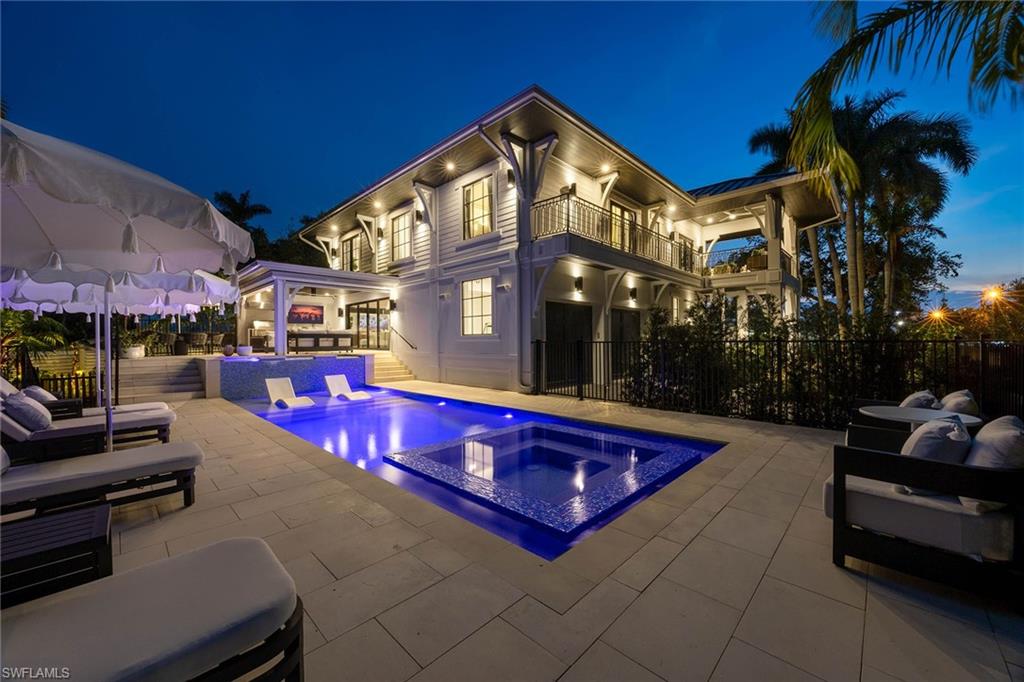 1355 4th Street South Naples, FL 34102 - Photo 50 of 50 a view of swimming pool with outdoor seating