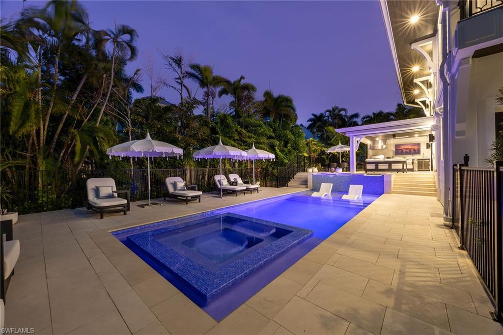 1355 4th Street South Naples, FL 34102 - Photo 5 of 50 a view of an outdoor space pool patio and outdoor seating