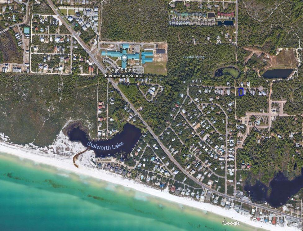 Lot 12 Spotted Dolphin Road Santa Rosa Beach, FL 32459 - Photo 1 of 6 a picture of a tree with a yard