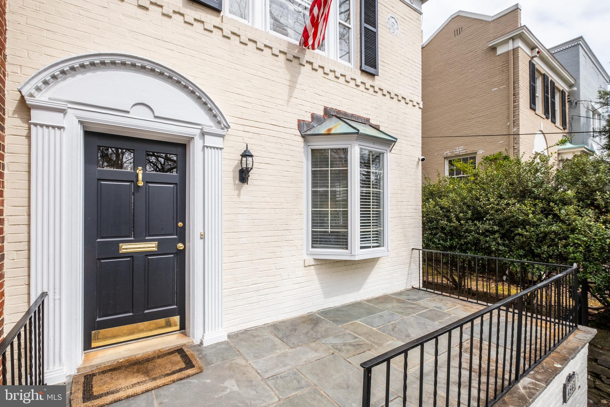 4843 Reservoir Road Northwest Washington, DC 20007 - Photo 1 of 25 Front terrace with sunny viewa