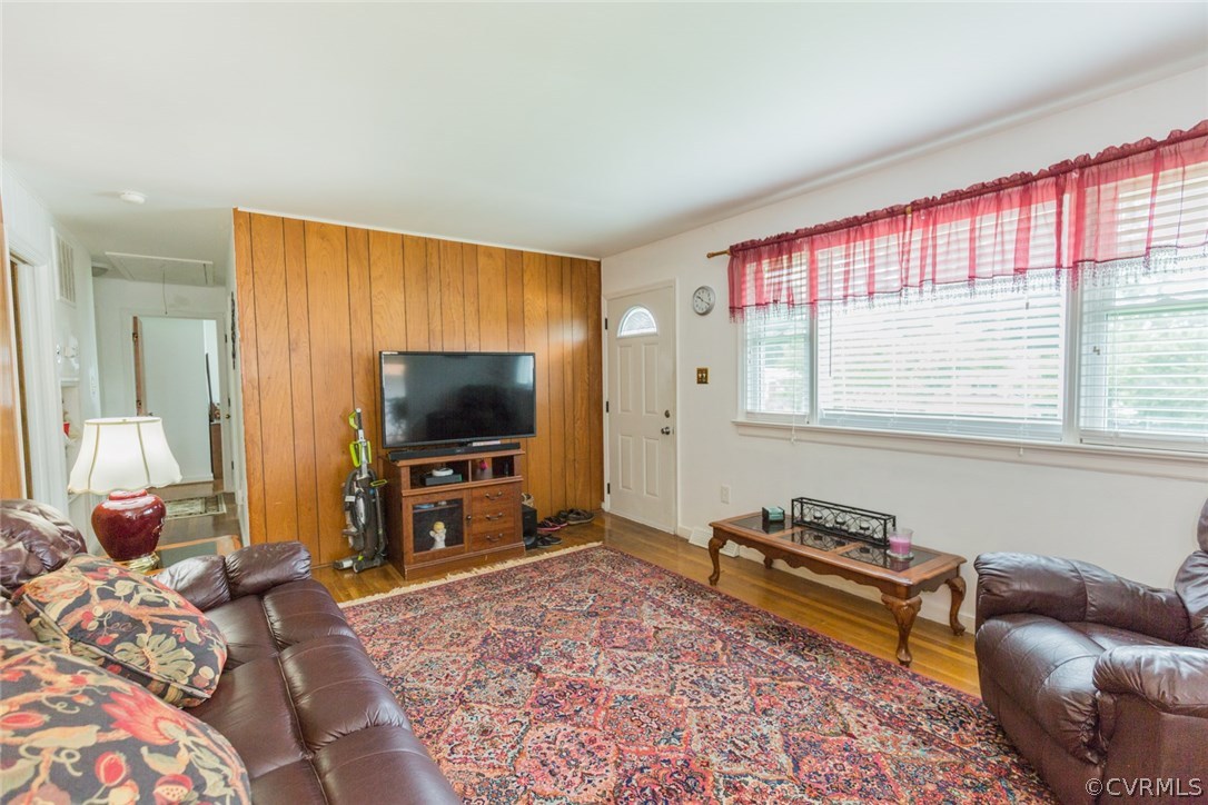 2918 Woodworth Road North Chesterfield, VA 23237 - Photo 11 of 16 a living room with furniture and a flat screen tv