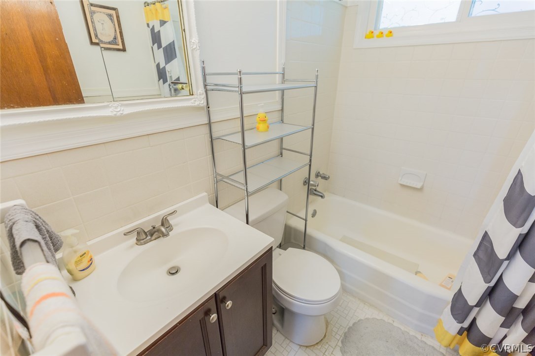 2918 Woodworth Road North Chesterfield, VA 23237 - Photo 12 of 16 a bathroom with a sink a toilet and bathtub