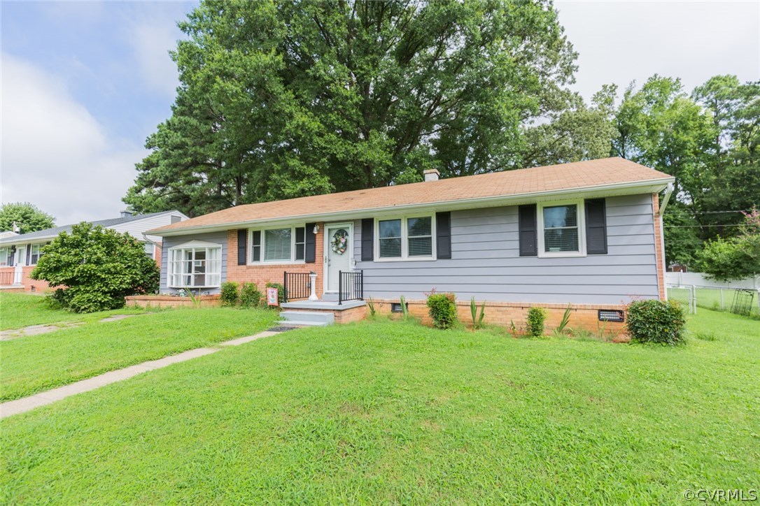 2918 Woodworth Road North Chesterfield, VA 23237 - Photo 2 of 16 a front view of house with yard and green space
